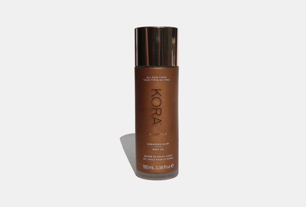 Shimmer in the sun with Kora’s new body glow oil - RUSSH